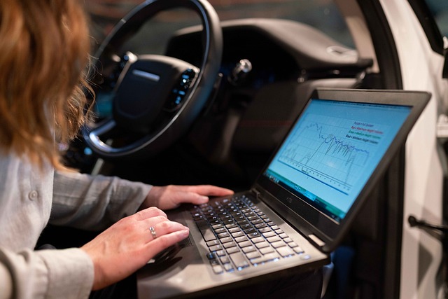 business professional analyzing data on laptop analytics dashboard